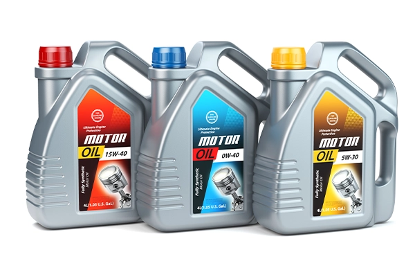 Multi-colored oil jugs with differing weights