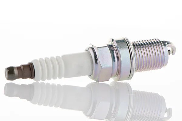 Spark plug on isolated background